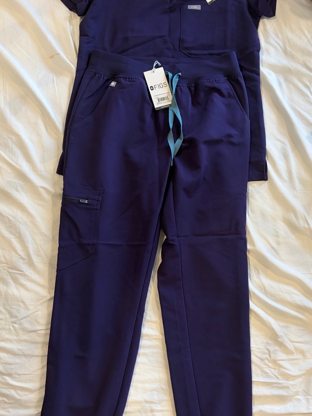 FIGS Scrubs in Purple jam colour.